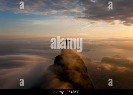 The giant Art Deco statue Jesus known as Cristo Redentor (Christ Redeemer) on Corcovado mountain in Rio de Janeiro Brazil. Stock Photo