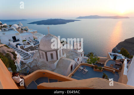 Church & Fira town at sunset, Fira, Santorini (Thira), Cyclades, Greece Stock Photo