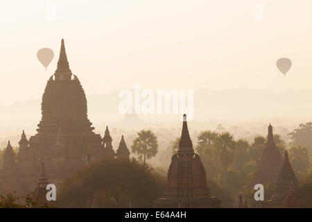 Ancient temple city of Bagan (also Pagan) & balloons at sunrise, Myanmar (Burma) Stock Photo