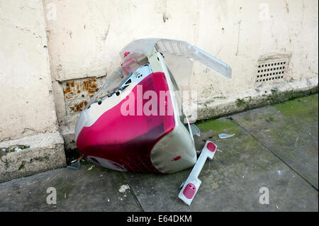 iMac computer thrown away on sidewalk Stock Photo