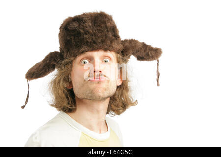 Crazy russian man with ear-flaps cap isolated over white background Stock Photo