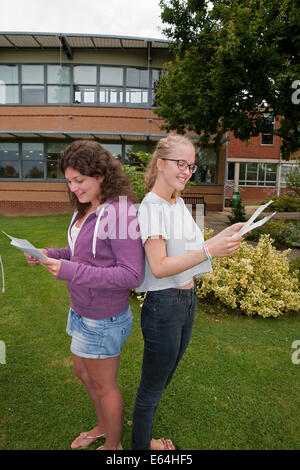 Bromley Kent, UK. 14th Aug, 2014. Students Alex Chrysosthnou and Caroline Farmery from Bromley High School receive their A Level result Credit: Keith Larby/Alamy Live News Stock Photo