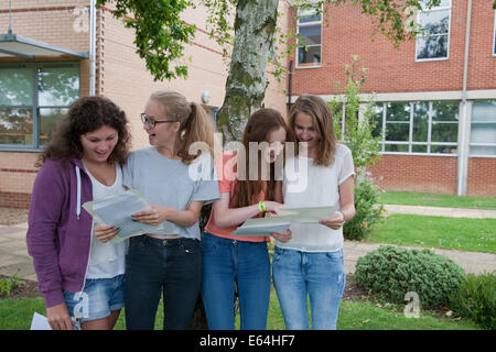 Bromley Kent, UK. 14th Aug, 2014.Four Students from Bromley High School study their A Level result Credit: Keith Larby/Alamy Live News Stock Photo