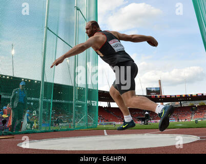 Zurich, Switzerland. 13th Aug, 2014. Robert Harting of Germany competes in the men's Discus throw Qualifying at the European Athletics Championships 2014 at the Letzigrund stadium in Zurich, Switzerland. Credit:  Action Plus Sports/Alamy Live News Stock Photo