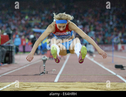 Zurich, Switzerland. 13th Aug, 2014. Anna Klyashtornaya of Russia competes in the women's long jump final at the European Athletics Championships 2014 at the Letzigrund stadium in Zurich, Switzerland, 13 August 2014. Credit:  Action Plus Sports/Alamy Live News Stock Photo