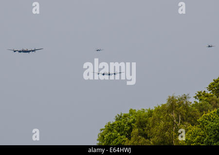 There are only two airworthy Avro Lancasters in the world and one of them has flown from Canada to join with the RAF's Battle of Britain Memorial Flight. Arriving with fighters over Biggin Hill, Kent, UK Stock Photo