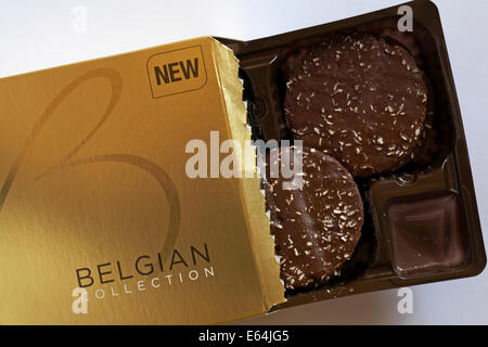 box of Marks & Spencer new Belgian Collection Biarritz biscuits open to show contents - thin & crisp tuile biscuits Stock Photo