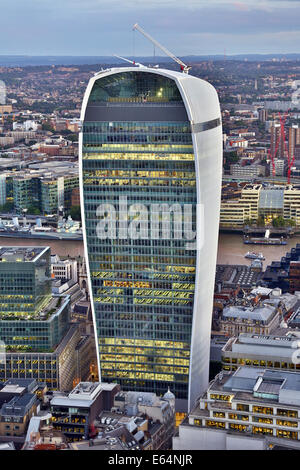 General view of buildings of the city skyline and the Walkie Talkie building at 20 Fenchurch Street at dusk in London, England Stock Photo