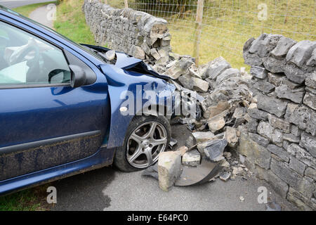 Car crash into wall, Bakewell, Derbyshire, England. Stock Photo