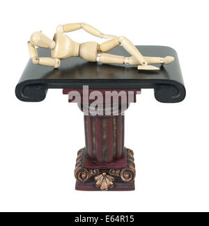 Laying down on a pillar stand with hand behind head - path included Stock Photo