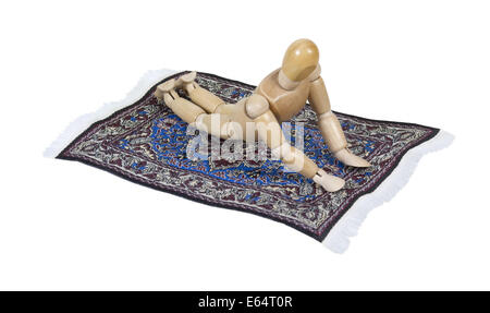 Riding flying carpet with intricate patterns and bright colors Stock Photo