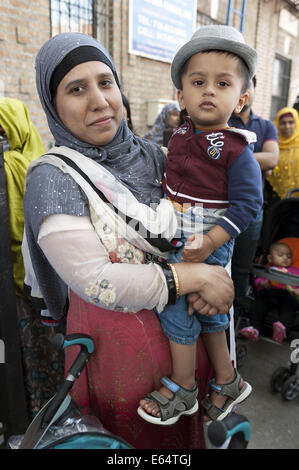 Mother and child at Bangladeshi street fair in Brooklyn in New York, 2014. Stock Photo