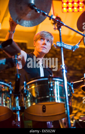 Live music female percussionist with Loose Tubes 21-piece big band on stage at Brecon Jazz Festival 2014 Stock Photo