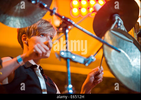 Live music female percussionist with Loose Tubes 21-piece big band on stage at Brecon Jazz Festival 2014 Stock Photo