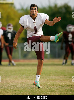 Aug. 14, 2014 - Tarpon Springs, Florida, U.S. - DOUGLAS R. CLIFFORD.Tarpon Springs High School kicker Louis Zervos follows through on a kick during a team practice on Thursday (8/14/14) at the school in Tarpon Springs. (Credit Image: © Douglas R. Clifford/Tampa Bay Times/ZUMA Wire) Stock Photo