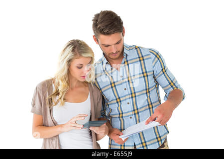 Attractive couple working out their finances Stock Photo