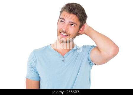Young man posing with hands on head Stock Photo
