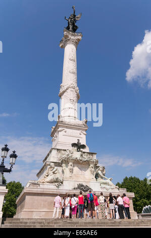 Group of tourists, the Girondist Column, Place des Quinconces, Bordeaux,  Gironde, France, Europe Stock Photo