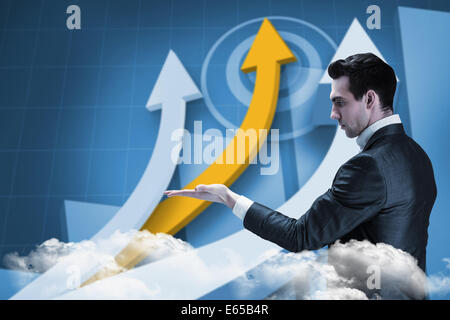 Composite image of businessman presenting with hand Stock Photo