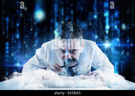 Composite image of mature businessman examining with magnifying glass Stock Photo