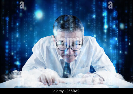 Composite image of mature businessman typing on keyboard Stock Photo