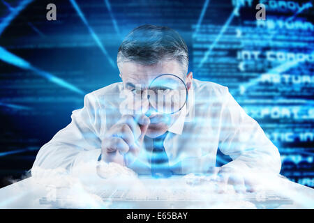 Composite image of mature businessman examining with magnifying glass Stock Photo