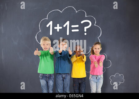 Composite image of cute kids showing thumbs up Stock Photo