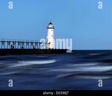 Brush Stroke Waves Motion Blurred In This Time Exposure At The Manistee North Pierhead Lighthouse, Lake Michigan, USA Stock Photo