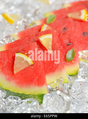 slices of red watermelon and ice cubes Stock Photo