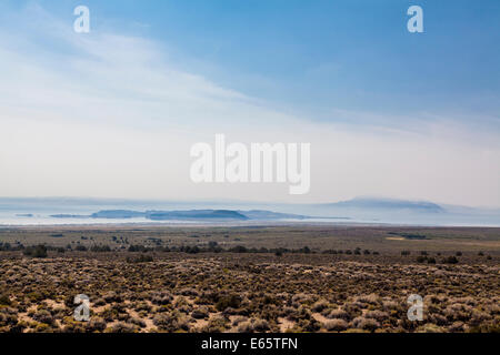 Smoke from the El Portal fire in Yosemite lays over Mono Lake and Mono craters Stock Photo