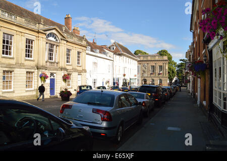 Cars parked at the side of the road in a Warwick Street Stock Photo