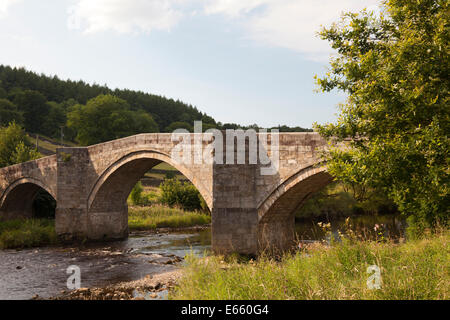 Barden Bridge crossing the River Wharfe, Barden, North Yorkshire Stock Photo