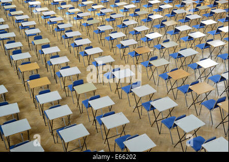 Tables and chairs are neatly lined up for exams in Whitworth Hall building at The University of Manchester (Editorial use only). Stock Photo