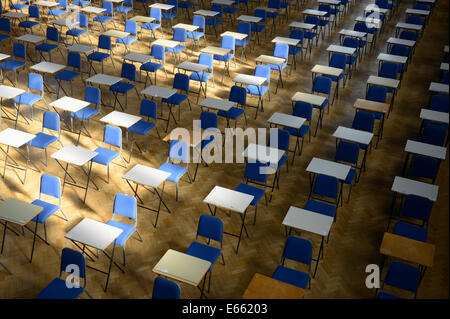 Tables and chairs are neatly lined up for exams in Whitworth Hall building at The University of Manchester (Editorial use only). Stock Photo
