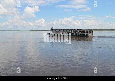 A passenger ferry on the Amazon river near the port of Iquitos, Peru Stock Photo