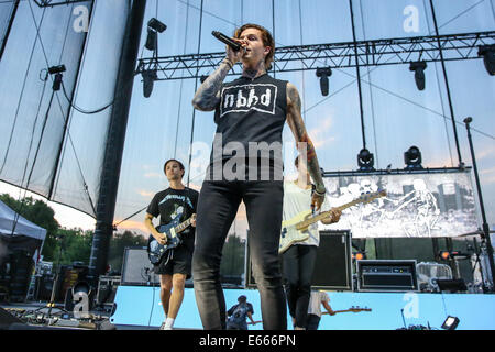 Raleigh, North Carolina, USA. 8th July, 2014. Music Artist THE NEIGHBOURHOOD performs at the Red Hat Amphitheater in North Carolina. The Neighbourhood (sometimes stylized as ''THE NBHD'') is an American rock band formed in August 2011. The band is composed of vocalist Jesse Rutherford, guitarists Jeremy Freedman and Zach Abels, bassist Mikey Margott and drummer Brandon Fried. © Andy Martin Jr./ZUMA Wire/Alamy Live News Stock Photo