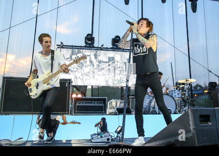 Raleigh, North Carolina, USA. 8th July, 2014. Music Artist THE NEIGHBOURHOOD performs at the Red Hat Amphitheater in North Carolina. The Neighbourhood (sometimes stylized as ''THE NBHD'') is an American rock band formed in August 2011. The band is composed of vocalist Jesse Rutherford, guitarists Jeremy Freedman and Zach Abels, bassist Mikey Margott and drummer Brandon Fried. © Andy Martin Jr./ZUMA Wire/Alamy Live News Stock Photo