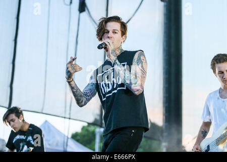 Raleigh, North Carolina, USA. 8th July, 2014. Music Artist THE NEIGHBOURHOOD performs at the Red Hat Amphitheater in North Carolina. The Neighbourhood (sometimes stylized as ''THE NBHD'') is an American rock band formed in August 2011. The band is composed of vocalist Jesse Rutherford, guitarists Jeremy Freedman and Zach Abels, bassist Mikey Margott and drummer Brandon Fried. © Andy Martin Jr./ZUMA Wire/Alamy Live News Stock Photo