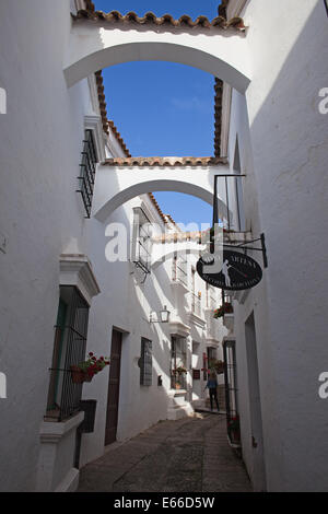 Narrow street in Poble Espanyol - Spanish Village in Barcelona, Catalonia, Spain. Stock Photo