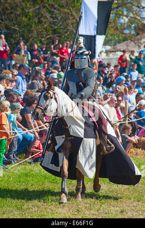 HINWIL, SWITZERLAND - MAY 18: Unidentified man in knight armor on the horse ready for action during tournament reconstruction ne Stock Photo