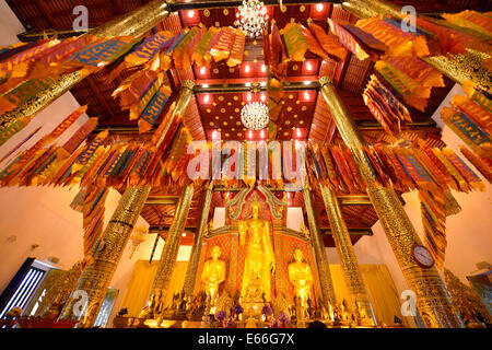 Offerings inside the Wat Chedi Luang, Chiang Mai, Thailand Stock Photo