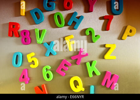 Colorful magnetic letters on refrigerator Stock Photo