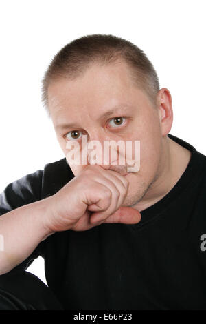 Serious man looking at camera isolated on a white background Stock ...