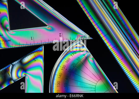 Cross Polarisation photograph of plastic  geometry set. Stock Photo