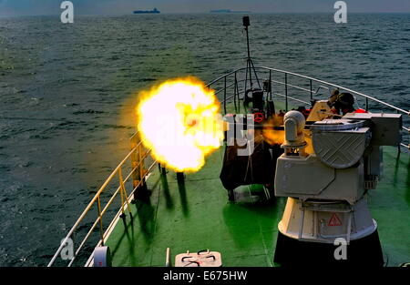 Fuzhou, China's Fujian Province. 16th Aug, 2014. Soldiers of Fujian Coast Guard Forces attend an offshore drill at the Meizhou Bay, southeast China's Fujian Province, Aug. 16, 2014. © Zhang Guojun/Xinhua/Alamy Live News Stock Photo