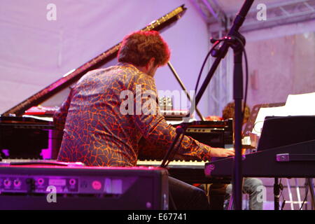 Worms, Germany. 16th August 2014. Pianist Benjamin Moussay from the Louis Sclavis Atlas Trio is pictured performing live on stage at the Jazz and Joy festival 2014 in Worms. The Louis Sclavis Atlas Trio performed live at the Jazz and Joy Festival 2014 in Worms. The founder Louis Sclavis has won the Prix Django Reinhardt award and the British Jazz-Award. Credit:  Michael Debets/Alamy Live News Stock Photo