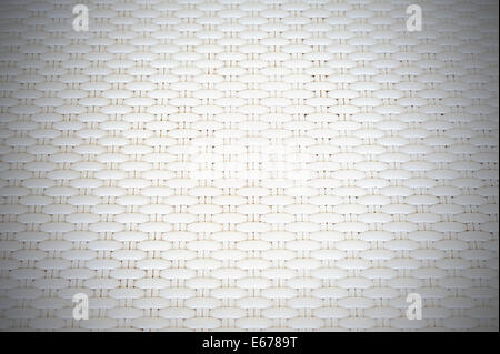 White cream plastic surface with repeating pattern. For use as background. Stock Photo
