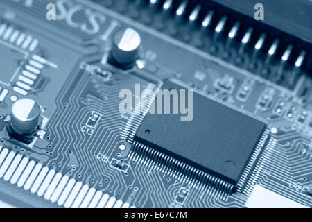 blue toned detail of a circuit board Stock Photo