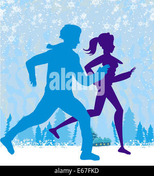 couple jogging in winter Stock Photo