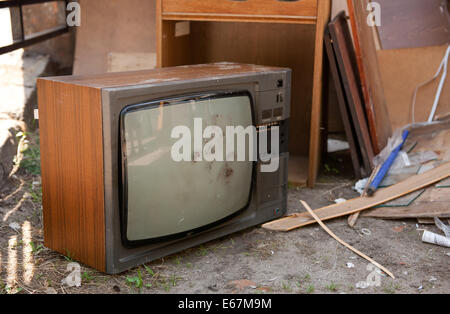 Old retro television set garbage thrown away Stock Photo
